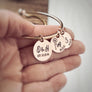 bracelet being held on womans hand to show size