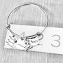bracelet on ruler to show 2.5 inches wide