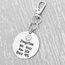 silver engraved stainless steel backpack tag keychain. engraved with a Smiley Face Image, Name Kingston Teachers name Mr Voss. Room number 201. and Bus 45