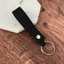Black leather strap keychain options.
