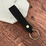 Black leather strap keychain options.