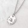 Silver Round pendant charm necklace engraved with infant angel baby and phrase "Too beautiful for earth"