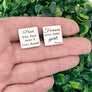 cufflinks in womans hand to show size
