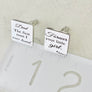 cufflinks on ruler to show measurement