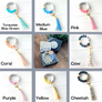 silicone beaded keychain wristlet color options. Turquoise, medium blue, pink, coral, purple, yellow, cheetah, and cow