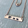 Mama Elephant with 2 babies engraved on rose gold bar necklace.
