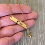 necklace on palm