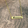 yellow gold gorilla bar necklace with 1 mom gorilla and 6 engraved baby gorillas