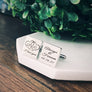Silver square cufflinks. first cuff is enggraved with 2 open hearts. In the heart is engraved with the grooms initial "D" and the other heart is an "E". underneath is "i love you". The second cufflink is engraved with the phrase " Always and Forever" and the couples wedding date 10.16.21
