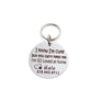Silver stainless steel dog collar id tag with black engraving "I know I'm cute but you can't keep me. I'm SO loved at home" with a picture of an open heart and dog paw pets name and telephone number