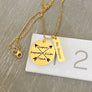 necklace on ruler to show measurement