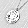 silver stainless steel 7/8" disc engraved with Libra, its constellation, symbol, and the Scales attached to a stainless steel cable chain with lobster clasp