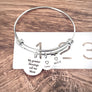 silver bracelet on ruler to show measurement of 2.5" wide