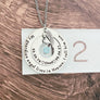 necklace on ruler to show measurement