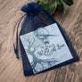 AA recovery keychain packaged in stamps of love organza gift bag.