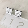 cufflinks on ruler to show measurements
