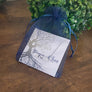 penguin bar necklace in blue organza gift bag from stamps of love