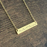 yellow gold stainless steel engraved morse code relentless bar necklace