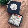 ornament in blue gift box from stamps of love