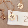 pendant on ruler to show size