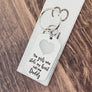 dog tag keychain on ruler to show 2" in length