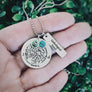 best friend necklace on a woman's hand to show size