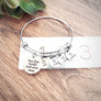 bracelet on ruler to show measurement of 2.5 wide