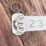 keychain on ruler showing measurement
