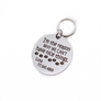 Silver stainless steel dog collar id tag with black engraving "You are the reason why we can't have nice things with a picture of paw prints, pets name and telephone number