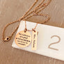 necklace on ruler to show measurement