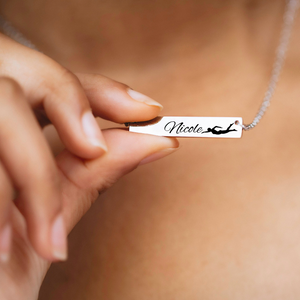 engraved bar necklace personalized with swimmers name and a image of a woman swimming breast strokes