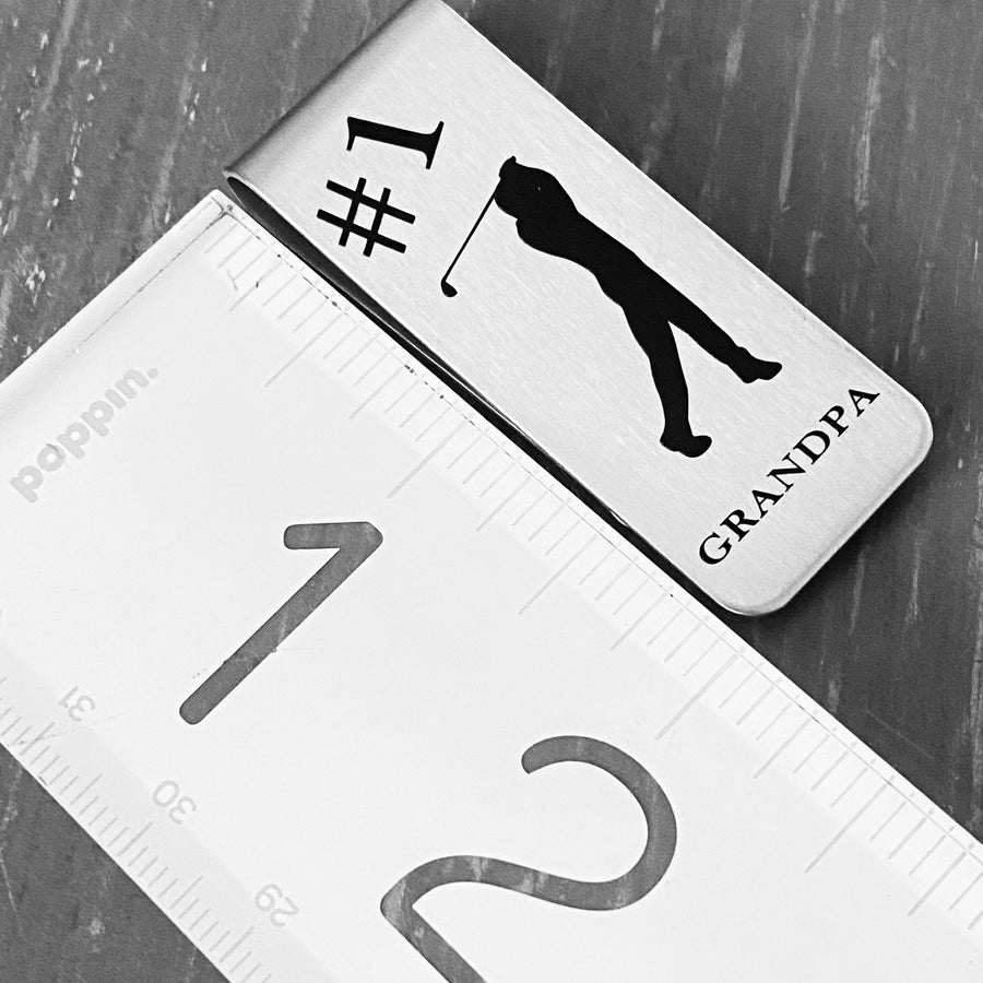 money clip by ruler to show measurement