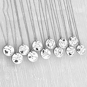 Picture of all 12 zodiac necklaces together