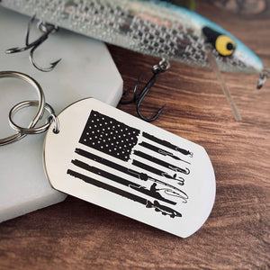 silver stainless steel dog tag keychain with a fishing symbols as the stripes on the american flag image 