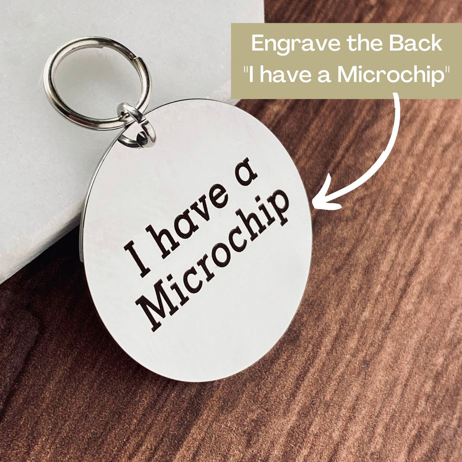 dog tag showing the option to have "I have a microchip" engraved on the back of the pet's tag