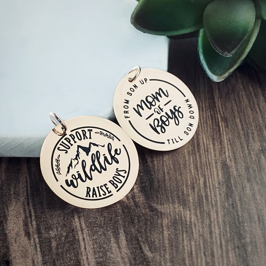 2 generic rose gold charm tags. "support wildlife raise boys" and "from son up to son down. mom of boys"
