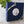 blue jewelry 3.5 inch X 3.5 inch jewelry box closed with a white bow stretch loop