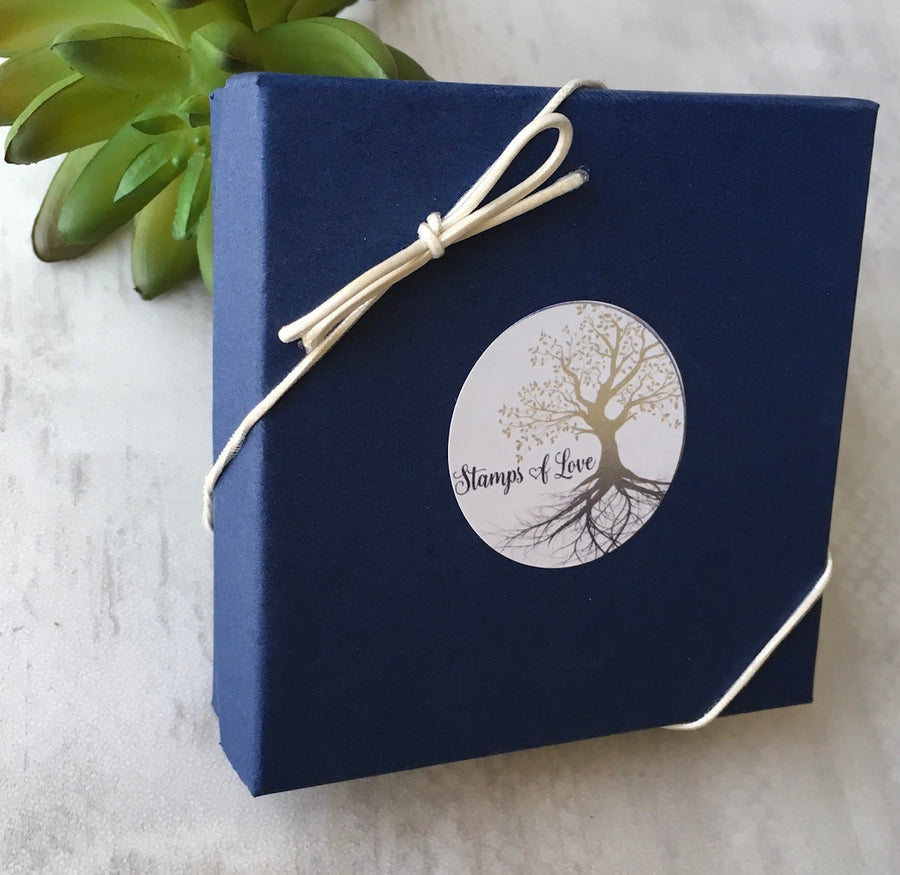stamps of love blue gift box with white bow stretch loop