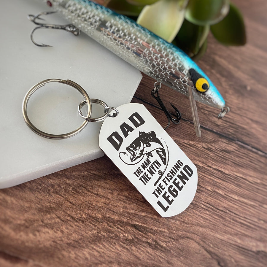 Silver stainless steel dog tag keychain engraved with the phrase, "Dad. The Man. The Myth. The Legend