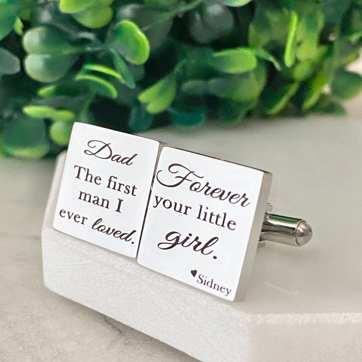 silver square stainless steel engraved cufflinks with the phrase "Dad The first man I ever loved. forever your little girl." and the name Sidney