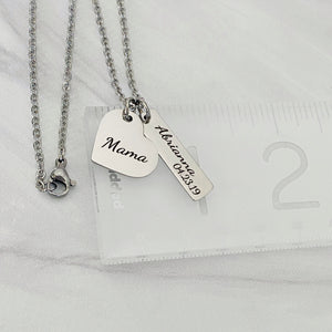silver necklace on ruler to show measurements