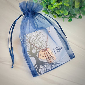 dainty blue organza gift bag from stamps of love