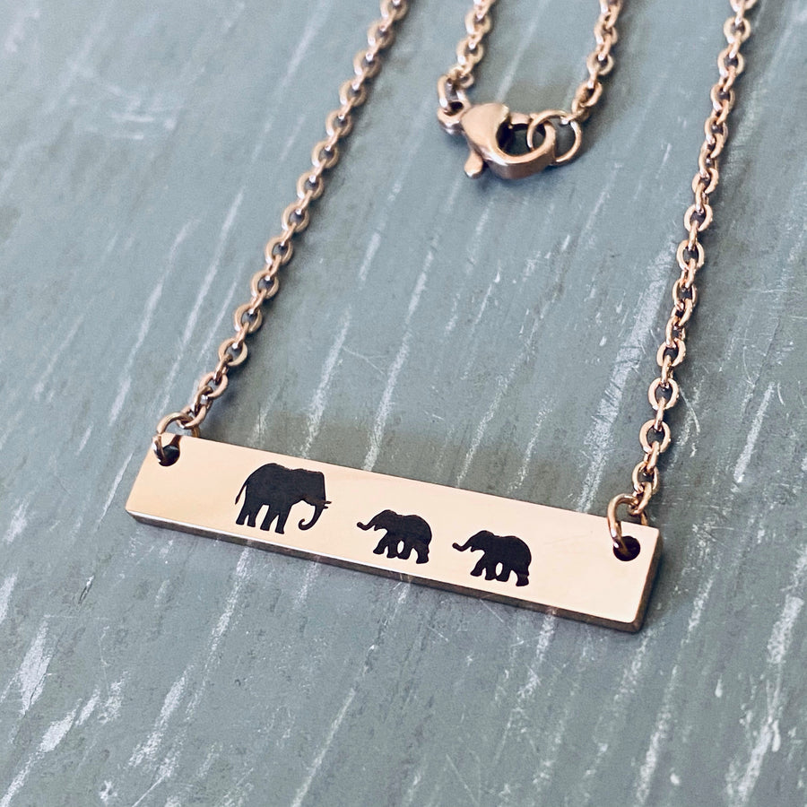 Mama Elephant with 2 babies engraved on rose gold bar necklace.