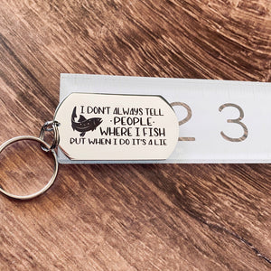dog tag keychain on ruler showing 2-inches long