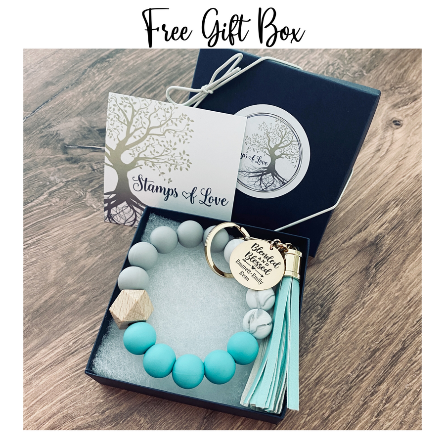 blended and blessed personalized charm tag on blue wristlet in free gift box from stamps of love