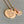 Rose Gold Necklace with 3/4 inch round pendant engraved with "God has you in his arms, I have you in my heart". Next to the disc is a 3/4 inch heart engraved with Brenton and a clear april stone. Pendants are attached to a cable chain