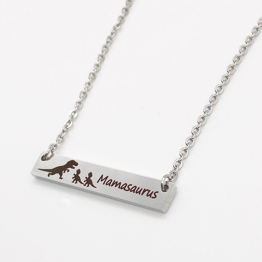 Silver Horizontal Bar necklace engraved with "Mamasaurus" and a Mom trex dino and 2 baby dinos