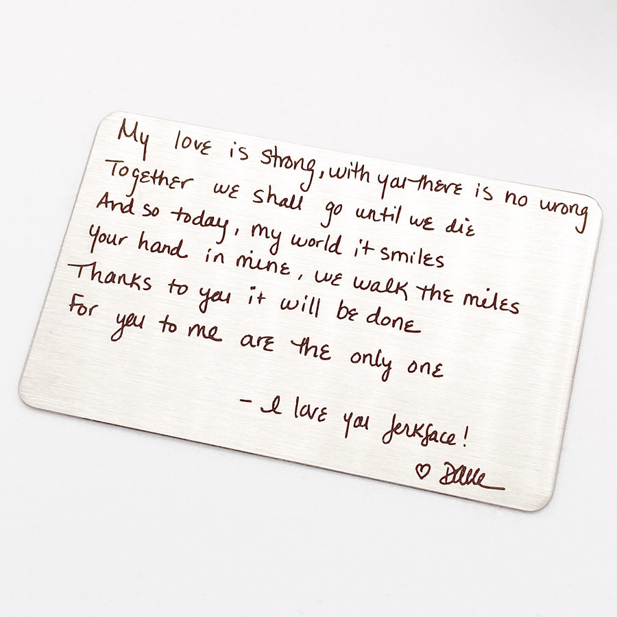 an engraved handwritten love note from a girlfriend to her fiance'. 