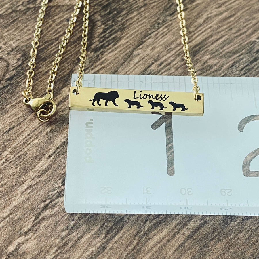 necklace on ruler to show bar length of 1 3/8" 
