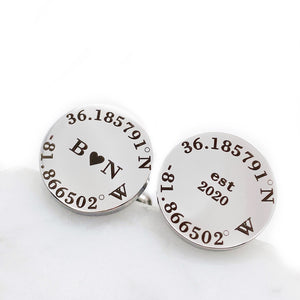 5/8 inch silver stainless steel round cufflinks. location coordinates engraved along round edge. Engraved "B", solid heart "N" in the center of one lcoation cufflink. The second cufflink is engraved with "est 2020".